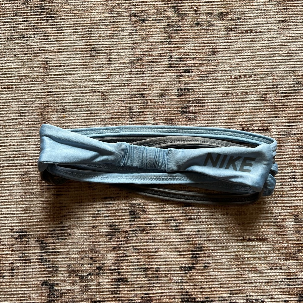 Gray and blue Nike headband